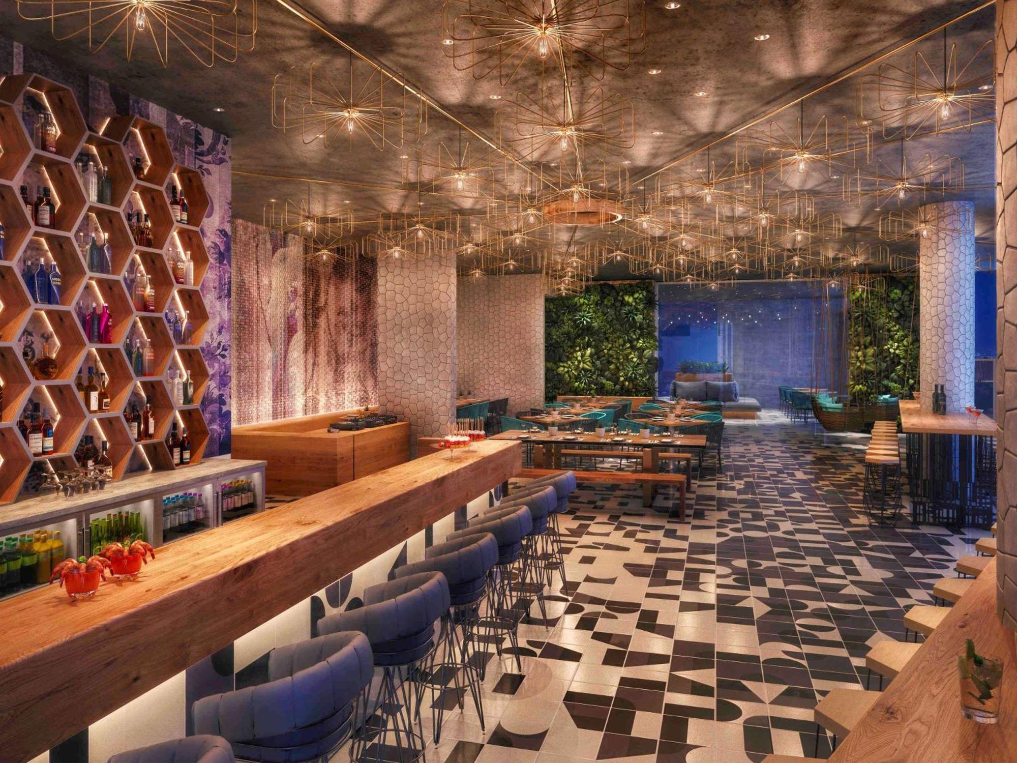 Moevenpick Hotel & Apartments Ghala Mascate Exterior foto The bar at the restaurant