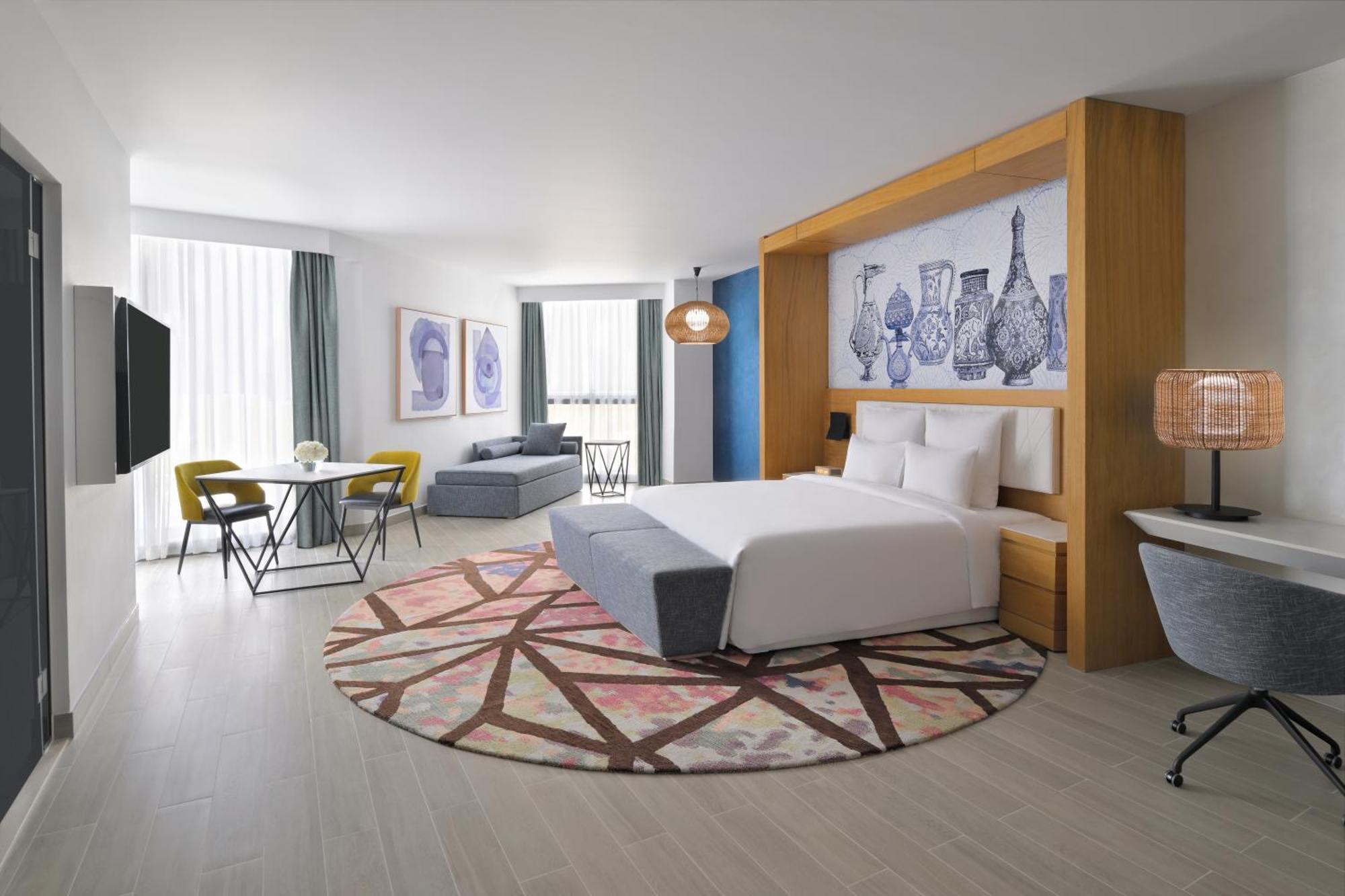Moevenpick Hotel & Apartments Ghala Mascate Exterior foto A typical room at the hotel